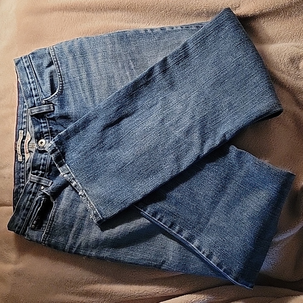 Tommy Hilfiger boyfriend cut size 10 jeans. Does have wear at cuff. No stains.